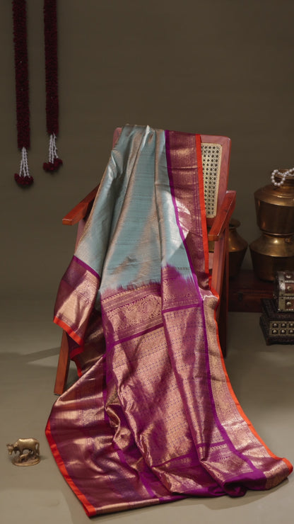 Light Aqua Blue Gadwal Silk Saree with Purple Zari Border and Orange Selvedge