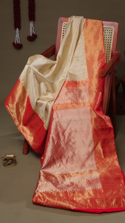 Cream Gadwal Silk Saree with Orange Tissue Border