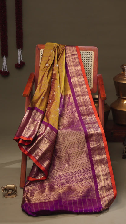 Mustard Gadwal Silk Saree with Purple Kanchi Zari Border & Peacock Motifs